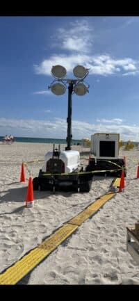 MegaWattage Portable Generator And Light Tower At Beach.