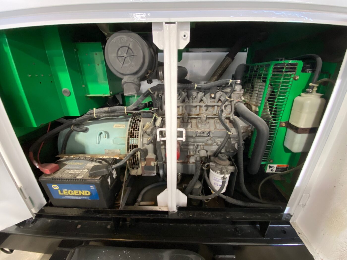 Inside View Of Generator Engine In Trailer-Mounted 20kW MultiQuip WhisperWatt Generator.