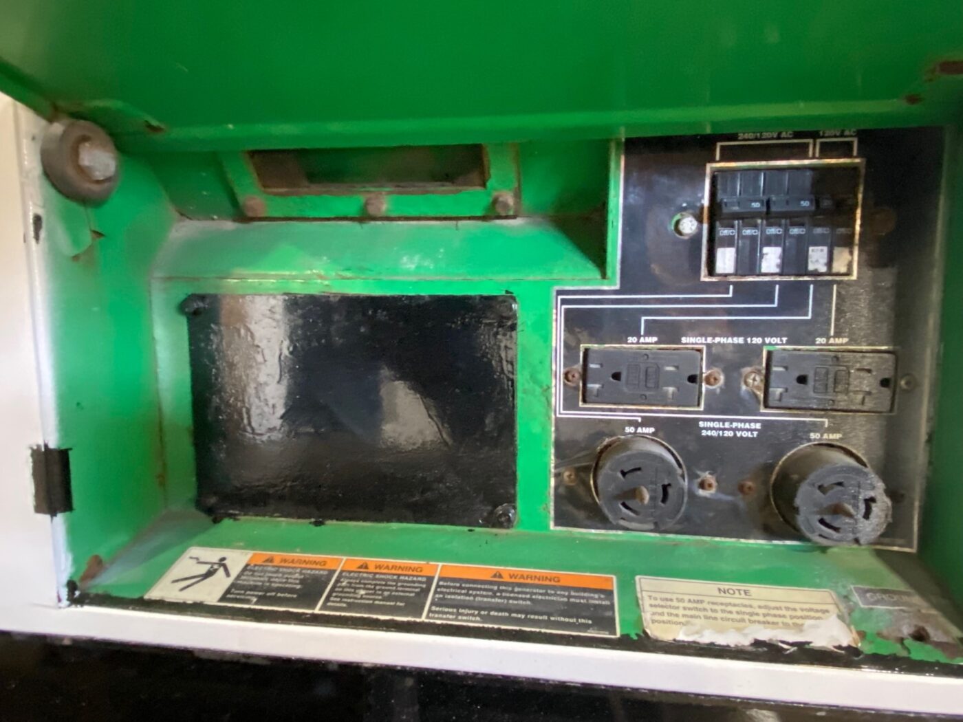 Electrical Panel View Of Trailer-Mounted 20kW MultiQuip WhisperWatt Generator.